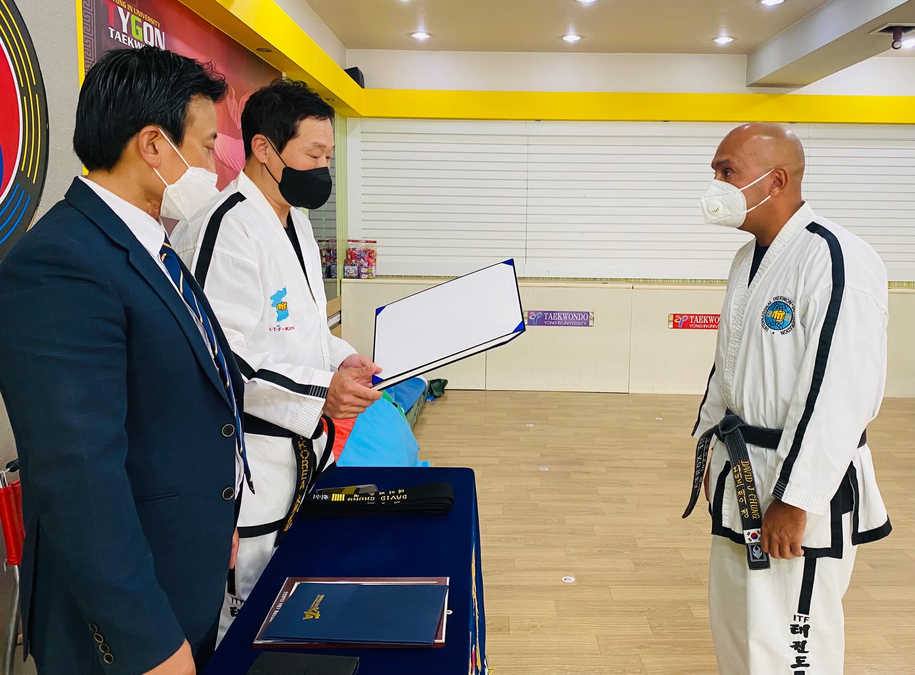 David Chung receiving recognition from his grandmaster in South Korea