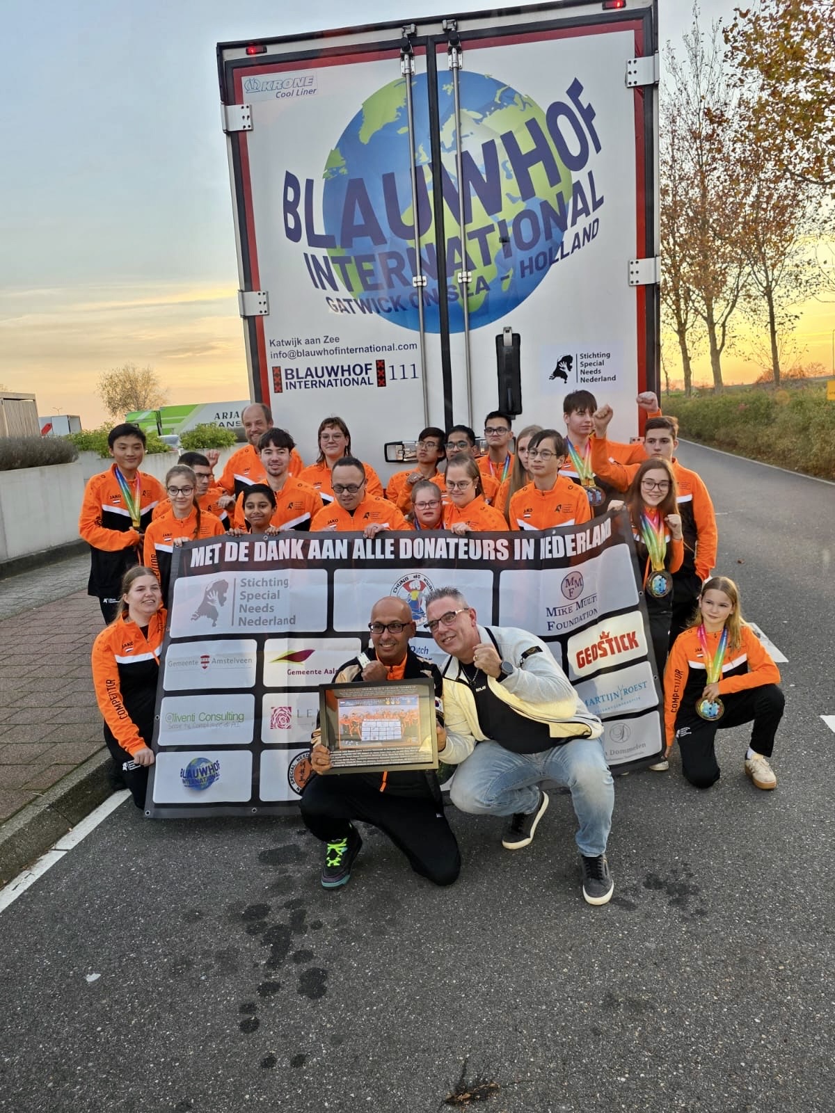 David Chung with the Dutch Special Needs Taekwondo Team and the medals won