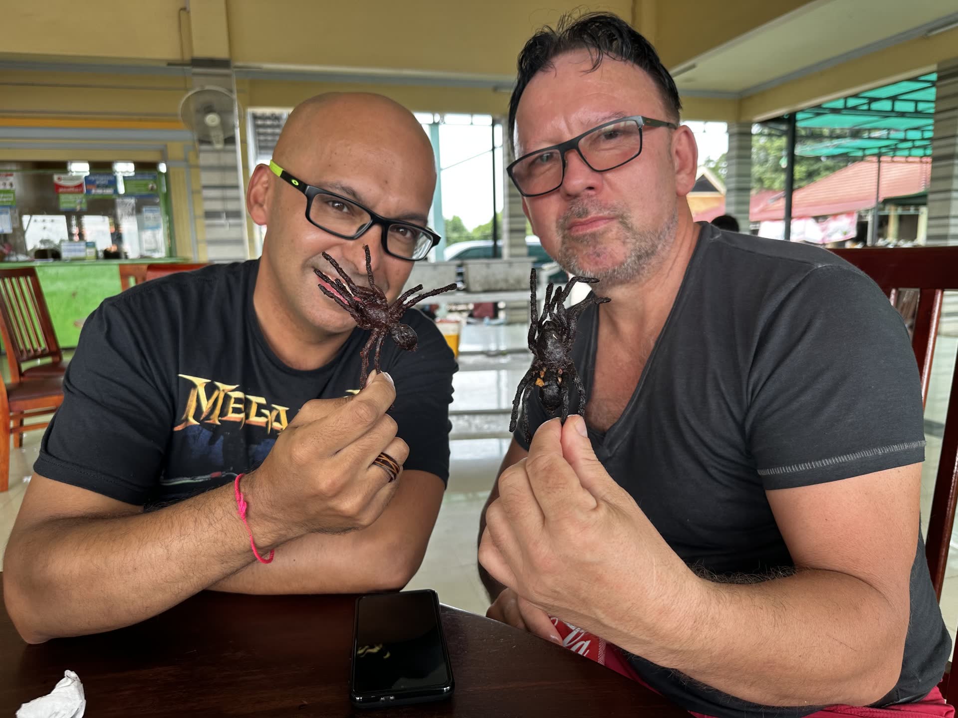 David Chung tasting local specialities during his journey through Cambodia